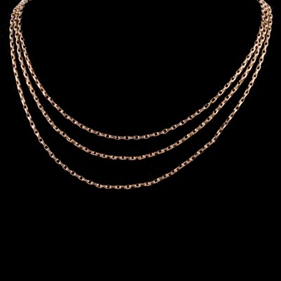 Lot 304 - A yellow metal three strand belcher link guard chain.