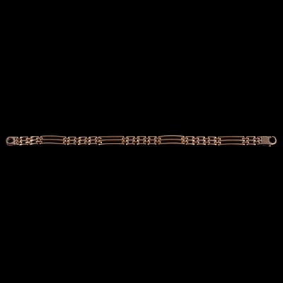 Lot 227 - A 9 carat yellow gold three bar gate link bracelet.