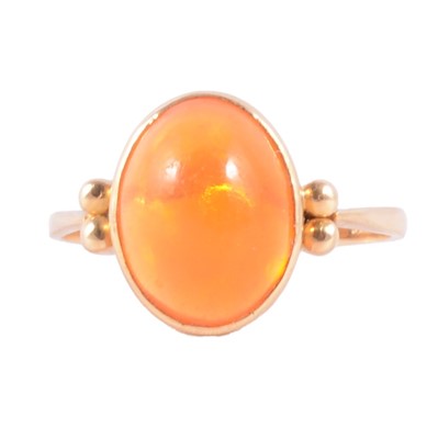 Lot 37 - A Mexican fire opal ring.