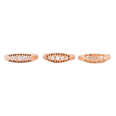 Lot 82 - Three diamond five stone rings.