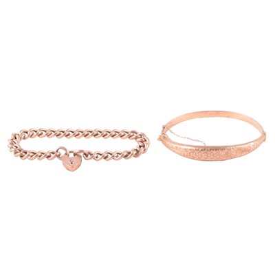 Lot 222 - A 9 carat rose gold hollow curb link bracelet, and a 9 carat rose gold half-hinged bangle.