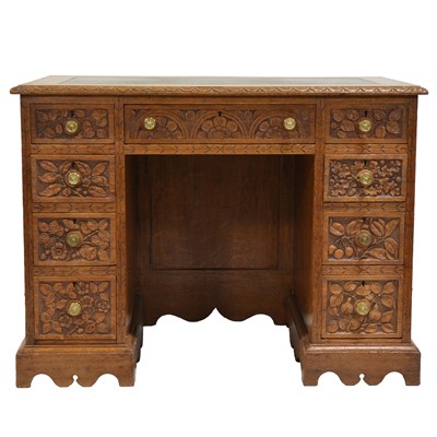 Lot 500 - Victorian oak kneehole desk