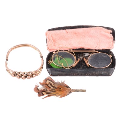 Lot 151 - A pair of unmarked yellow metal spectacles, and a yellow metal half-hinged bangle.
