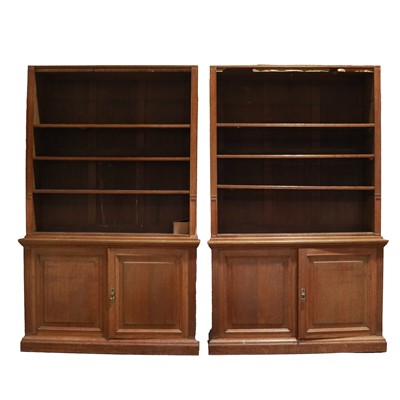 Lot 345 - Pair of late Victorian oak bookcases
