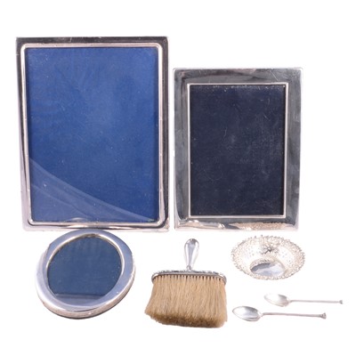 Lot 235 - Three silver-mounted photograph frames, silver teaspoons, bonbon dish and white metal-mounted brush.