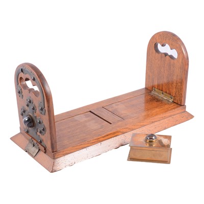Lot 154 - Betjemann's sliding book rack and a small brass box with agate