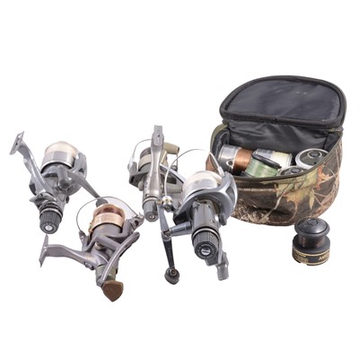 Lot 212 - Four Shimano spinning reels with spare spools