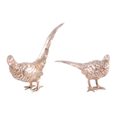 Lot 290 - Pair of cast silver models of a cock and hen pheasant