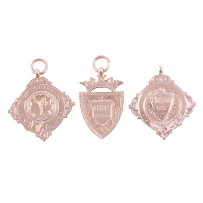 Lot 268 - Three 9ct gold fobs