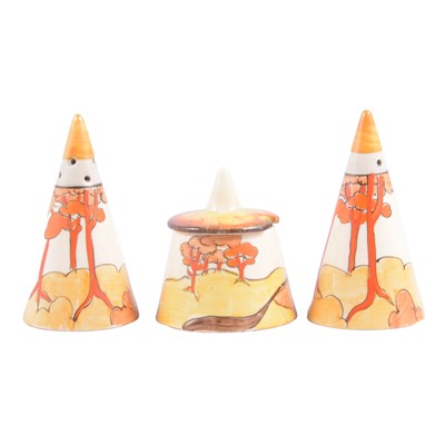 Lot 35 - Clarice Cliff, 'Coral Firs' three-piece Conical cruet set