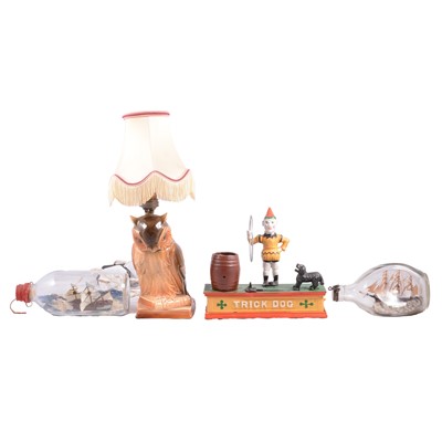 Lot 155 - Novelty pottery owl lamp, two ships in bottles, and a coin bank