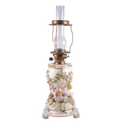 Lot 20 - German porcelain oil lamp.