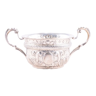 Lot 230 - Charles II style silver porringer, Nathan & Hayes