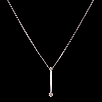 Lot 256 - A diamond pendant on a chain.
