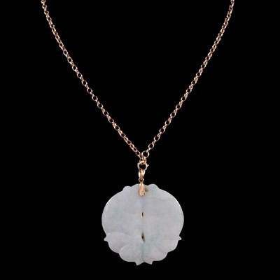 Lot 269 - A large jadeite pendant on a chain.
