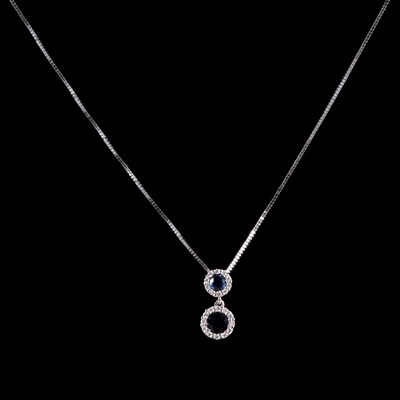 Lot 276 - A sapphire and diamond pendant on a chain, and matching earstuds.