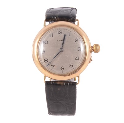Lot 431 - A yellow metal open face pocket watch converted to a wristwatch.