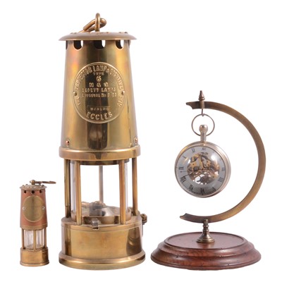 Lot 145 - Brass miner's lamp, miniature miner's lamp and a reproduction pocket watch
