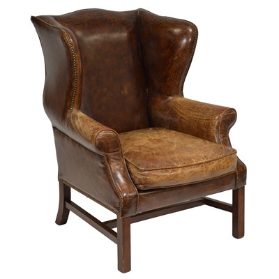 Lot 350 - Georgian style leather wing-back armchair