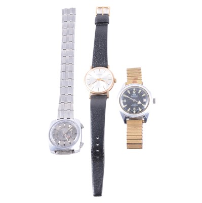 Lot 433 - Garrard - a gentleman's yellow metal presentation wristwatch, and two other wristwatches.
