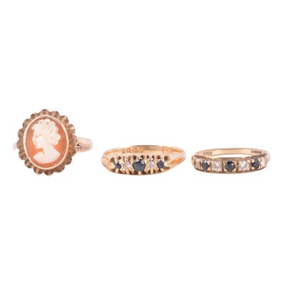 Lot 47 - Three gemset gold rings, sapphire and diamond, sapphire and cubic zirconia, carved shell cameo.