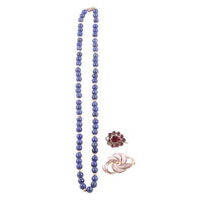 Lot 161 - A 9 carat gold brooch, garnet brooch, and lapis lazuli and yellow bead necklace.