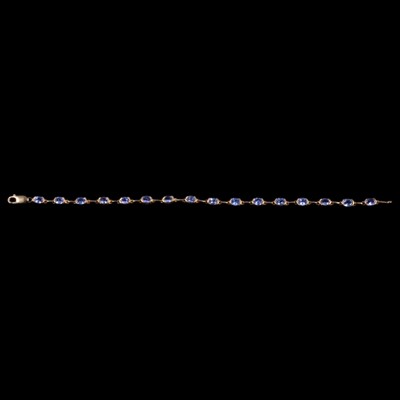 Lot 211 - A tanzanite bracelet.