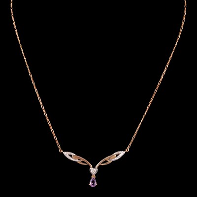 Lot 264 - An amethyst and diamond necklace.