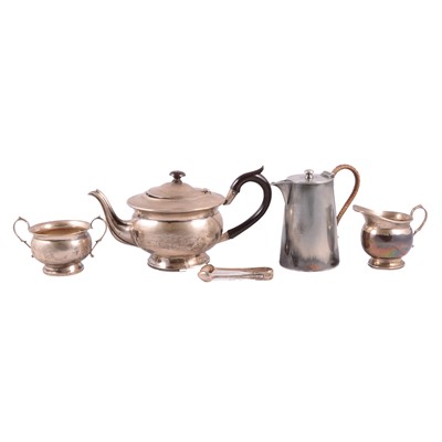 Lot 257 - Silver three piece teaset, sugar tongs and plated hot water jug.