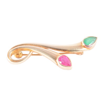 Lot 271 - An emerald and ruby brooch.