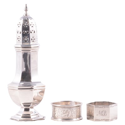 Lot 154 - Silver caster and two silver napkin rings
