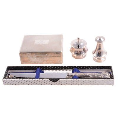 Lot 229 - A silver cigarette box, bread knife, mustard and pepper pot, condiment spoons.
