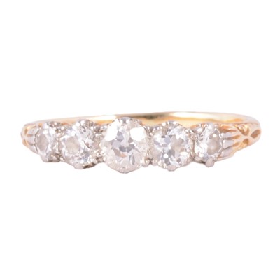 Lot 84 - A diamond five stone ring.