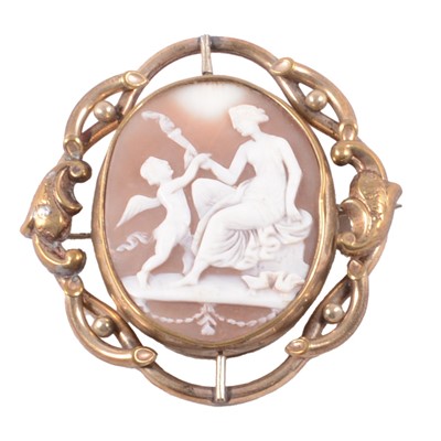 Lot 191 - A Victorian oval carved shell cameo brooch in a gold-plated mount.