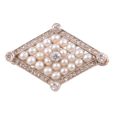 Lot 169 - A diamond and pearl lozenge shape brooch.