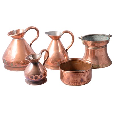Lot 127 - Set of three copper haystack measures, two copper pans