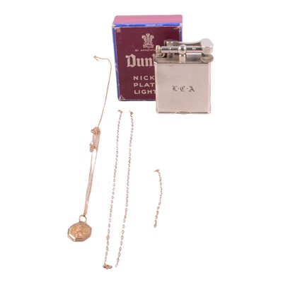 Lot 210 - Dunhill nickle plated lighter, and a 9ct gold St Christopher
