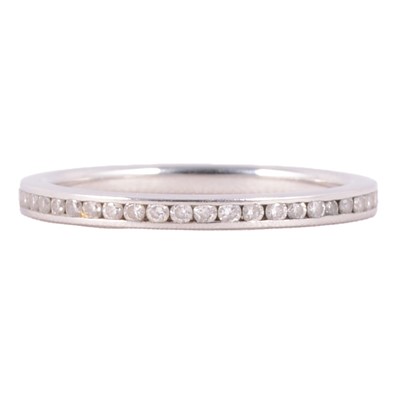 Lot 95 - A diamond full eternity ring.