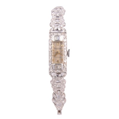 Lot 1065 - Exquisit - a lady's vintage diamond set cocktail bracelet wristwatch.