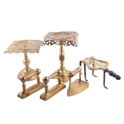 Lot 78 - Brass doorstop, trivets, andirons, and other brassware