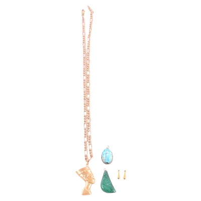 Lot 154A - An Ancient Egyptian style bust pendant on a chain, two brooches, and two metal fittings.