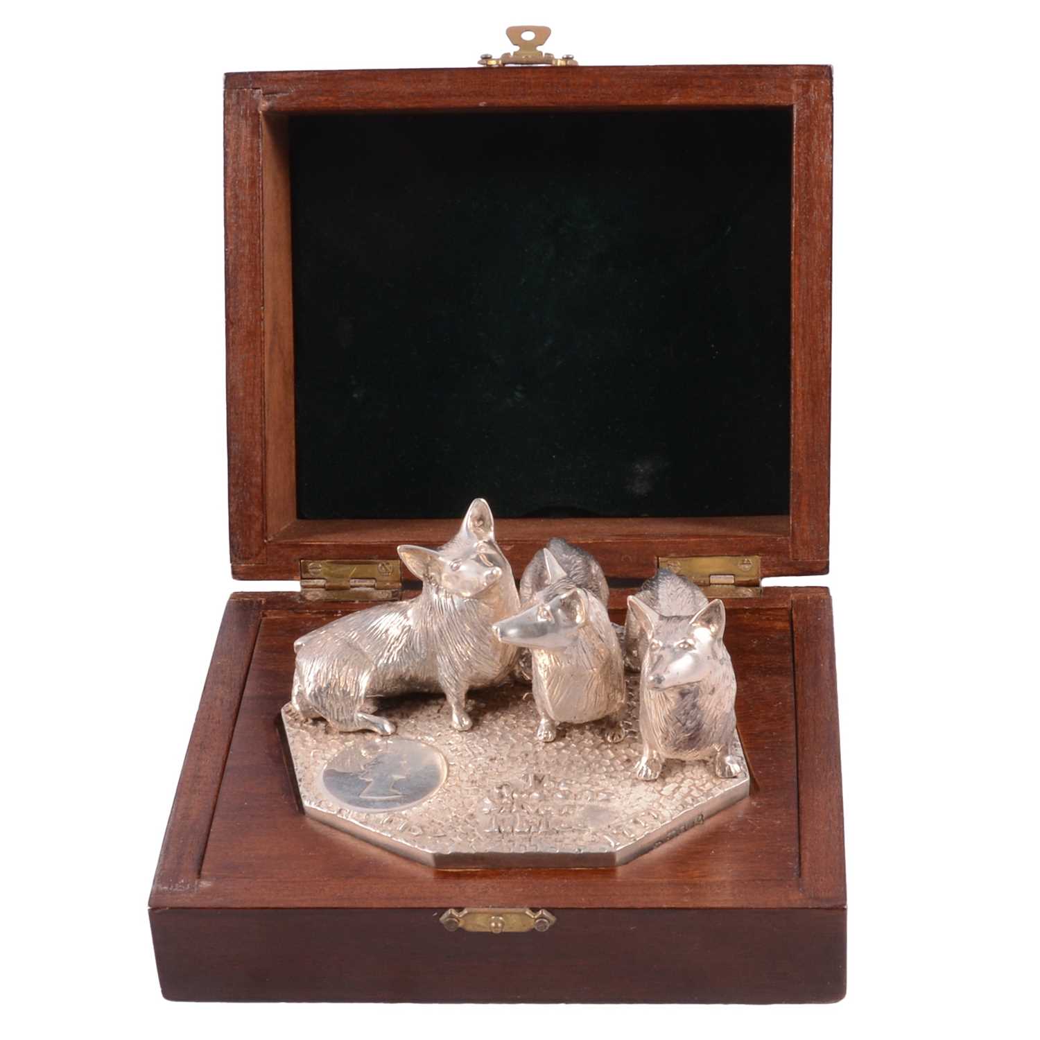 Lot 227 - Cast silver group, Royal Corgis