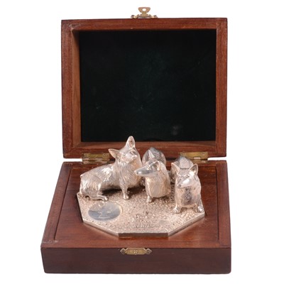 Lot 227 - Cast silver group, Royal Corgis