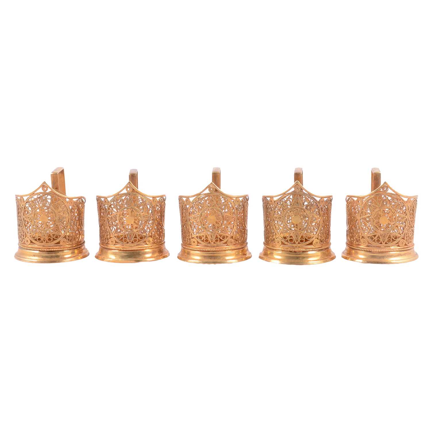 Lot 219 - Five gilt metal cup frames