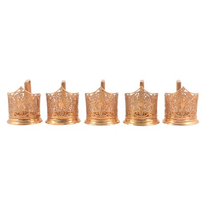 Lot 219 - Five gilt metal cup frames