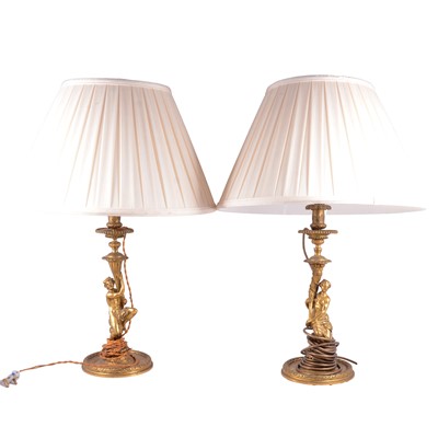 Lot 341 - Pair of gilt metal table lamps, converted from candlesticks