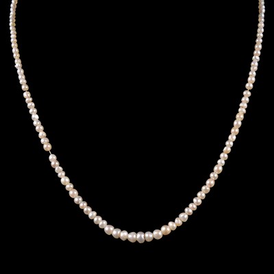 Lot 322 - A pearl necklace with diamond set clasp.