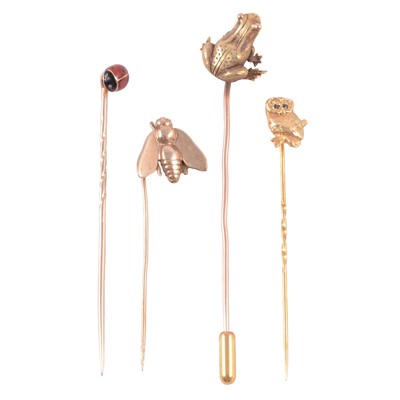 Lot 378 - CATALOGUE AMENDMENT - Four stick pins, owl, frog, LADYBIRD, and bee.