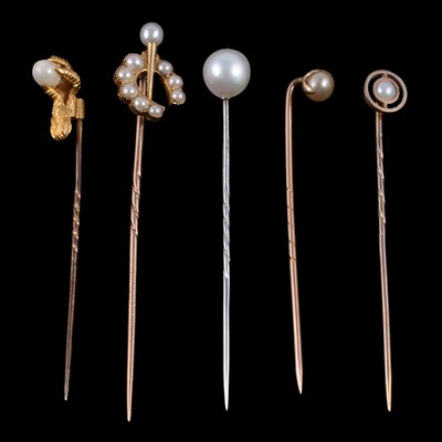 Lot 345 - Five pearl set stick pins.