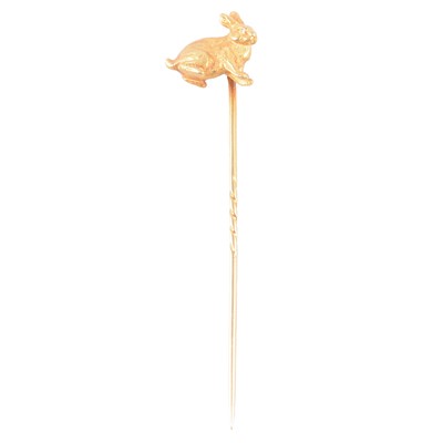Lot 367 - A yellow metal rabbit stick pin.